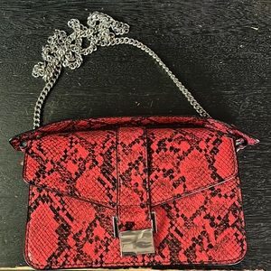Red snake skin bag